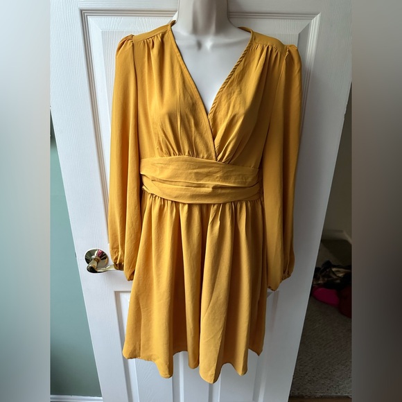 Elegant and Fun Butter Yellow Mini Dress - Picture 1 of 3